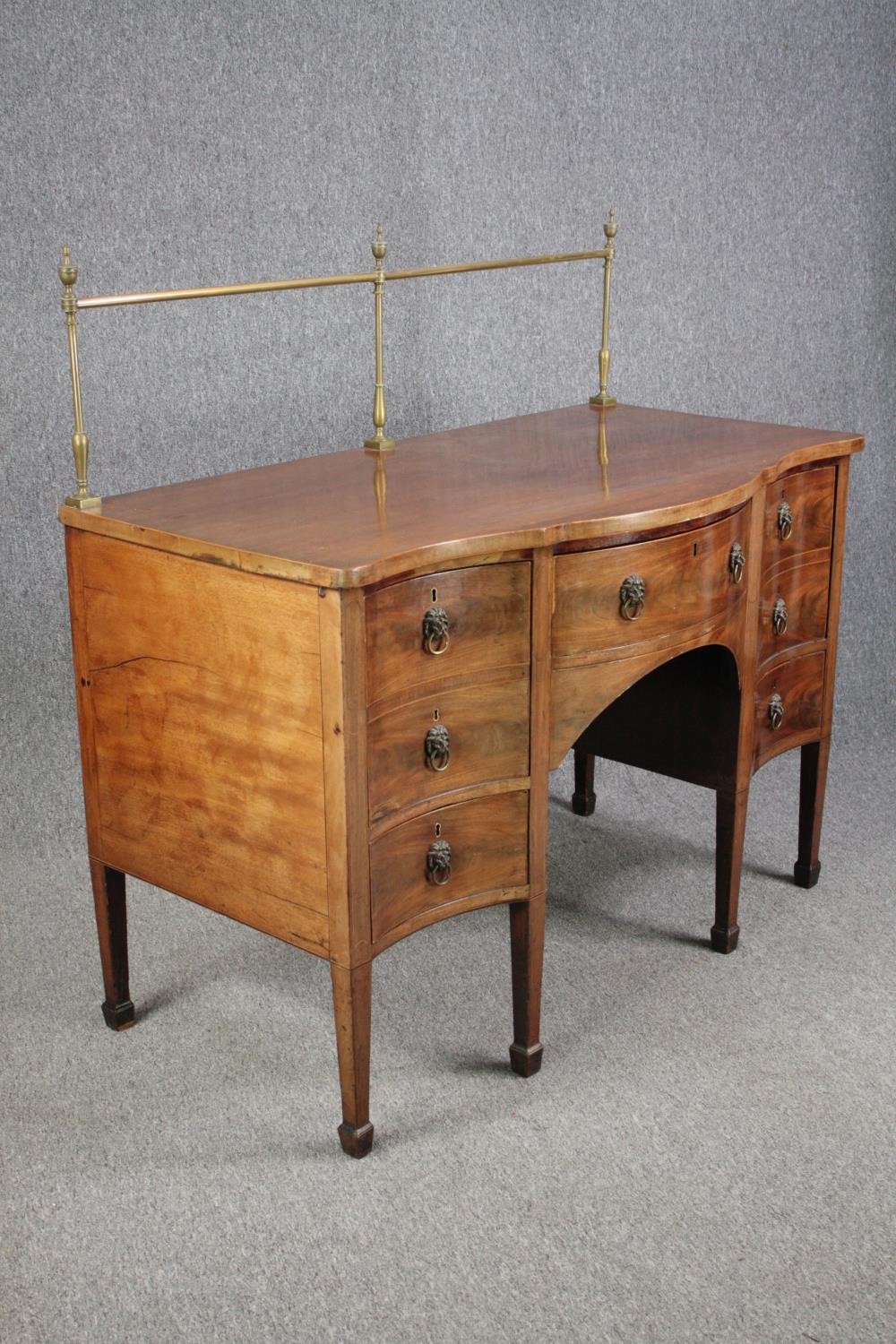 Sideboard, late Georgian mahogany serpentine fronted with brass rail. H.129 W.136 D.73cm. - Image 2 of 7