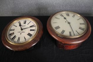Two wall clocks. One made by Smiths Enfield, London the other without a makers mark. Dia.42cm. (