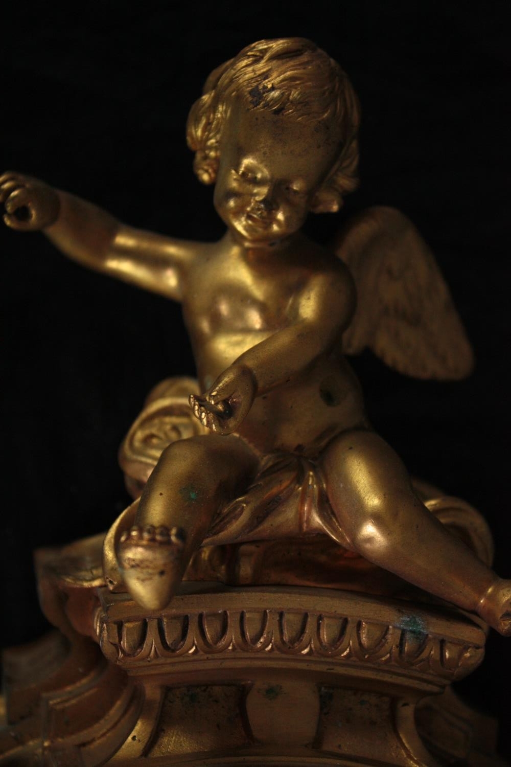 A Rococo cartel style gilt metal clock mounted with a cherub. H.46 W.27cm. - Image 7 of 7