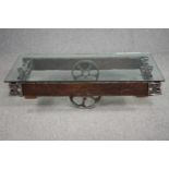 A vintage coffee table in the form of a railway tender made from reclaimed parts. H.33 W.139 D.65cm.