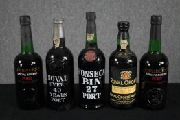 A collection of five unopened bottles of Port including Noval Over 40 Years Port and Cockburn's