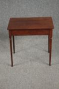 A 19th century mahogany lamp table on slender turned tapering supports. H.50 W.54 D.38cm.