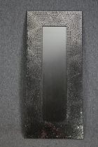 A contemporary wall mirror in mosaic glass frame. H.123 W.53cm.