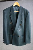 A vintage bespoke made teal silk mix jacket with mother of pearl buttons and maker's label, (to