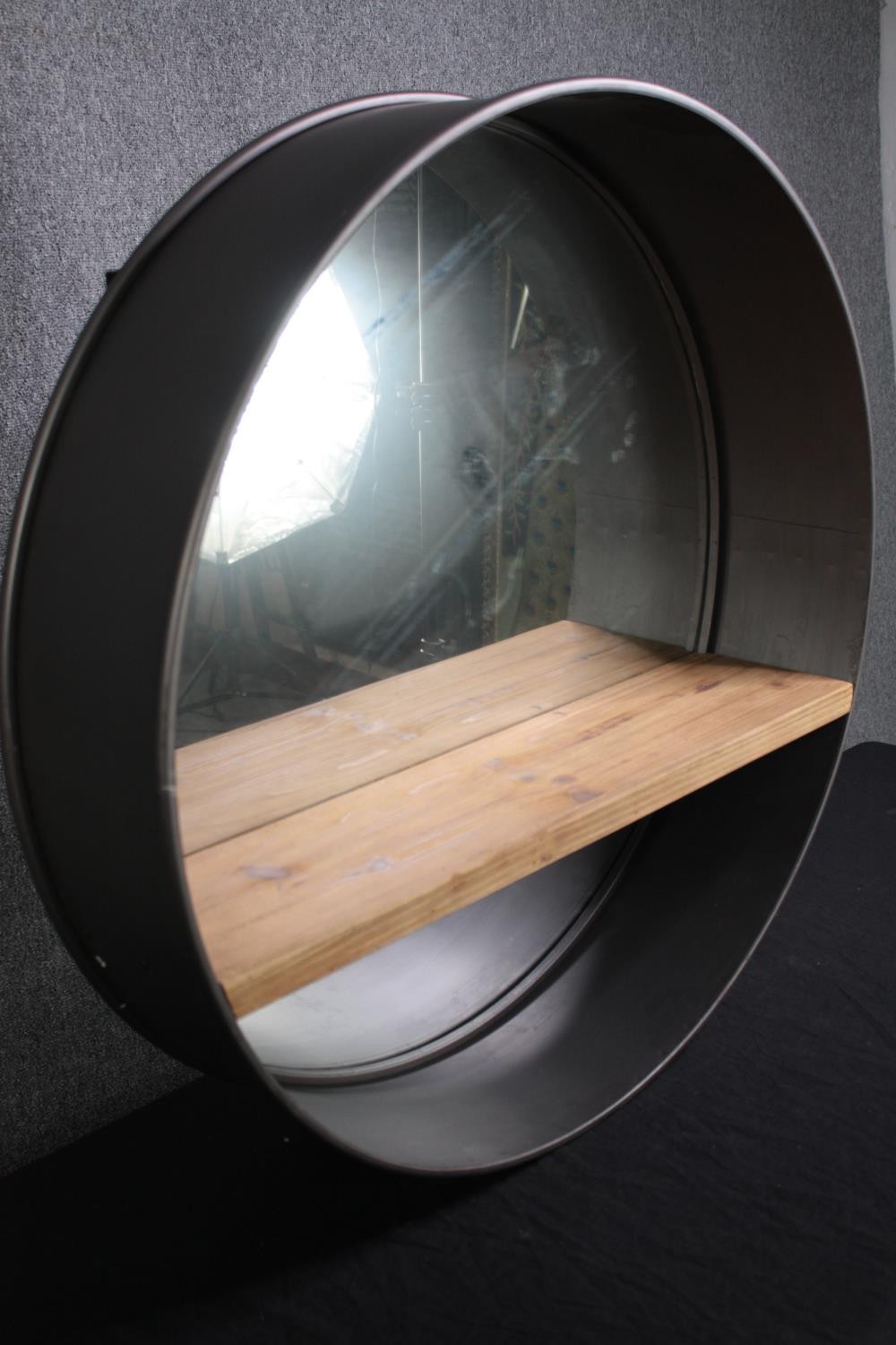 A contemporary industrial style metal framed mirror. Dia.80cm. - Image 2 of 4