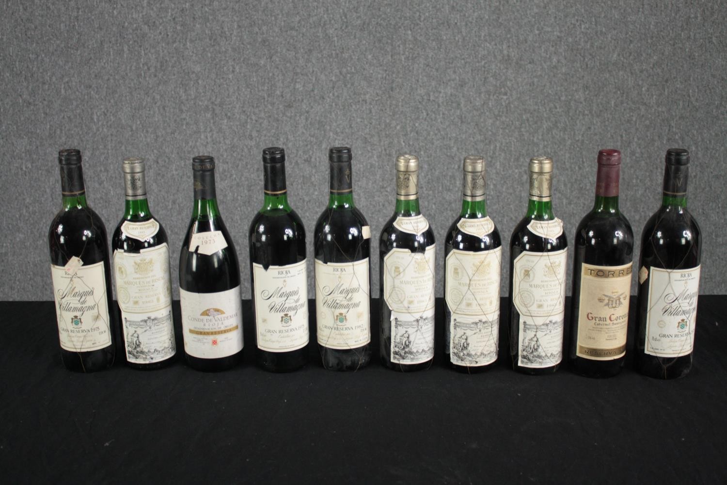 Nine bottles of Rioja and one bottle of Torres from the 70s and 80s. Includes Marqués de