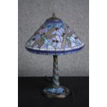 A large Tiffany style desk lamp with leaded glass shade and base. Decorated with dragonflies. H.