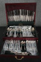 A steel cutlery canteen made in Sheffield by Butler. Includes spoons, desert and fish forks, H.16