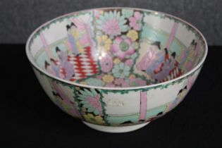 A hand coloured Chinese bowl. Famille Rose. Early twentieth century. H.14 Dia.31 cm.