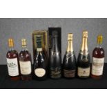 A mixed collection of seven bottles of red and sparkling wine. Includes a bottle of Lindauer Brut