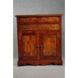 A Stewart Linford antique style burr elm dwarf cabinet. H.112 W.102 D.30cm.