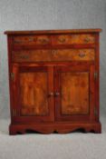 A Stewart Linford antique style burr elm dwarf cabinet. H.112 W.102 D.30cm.