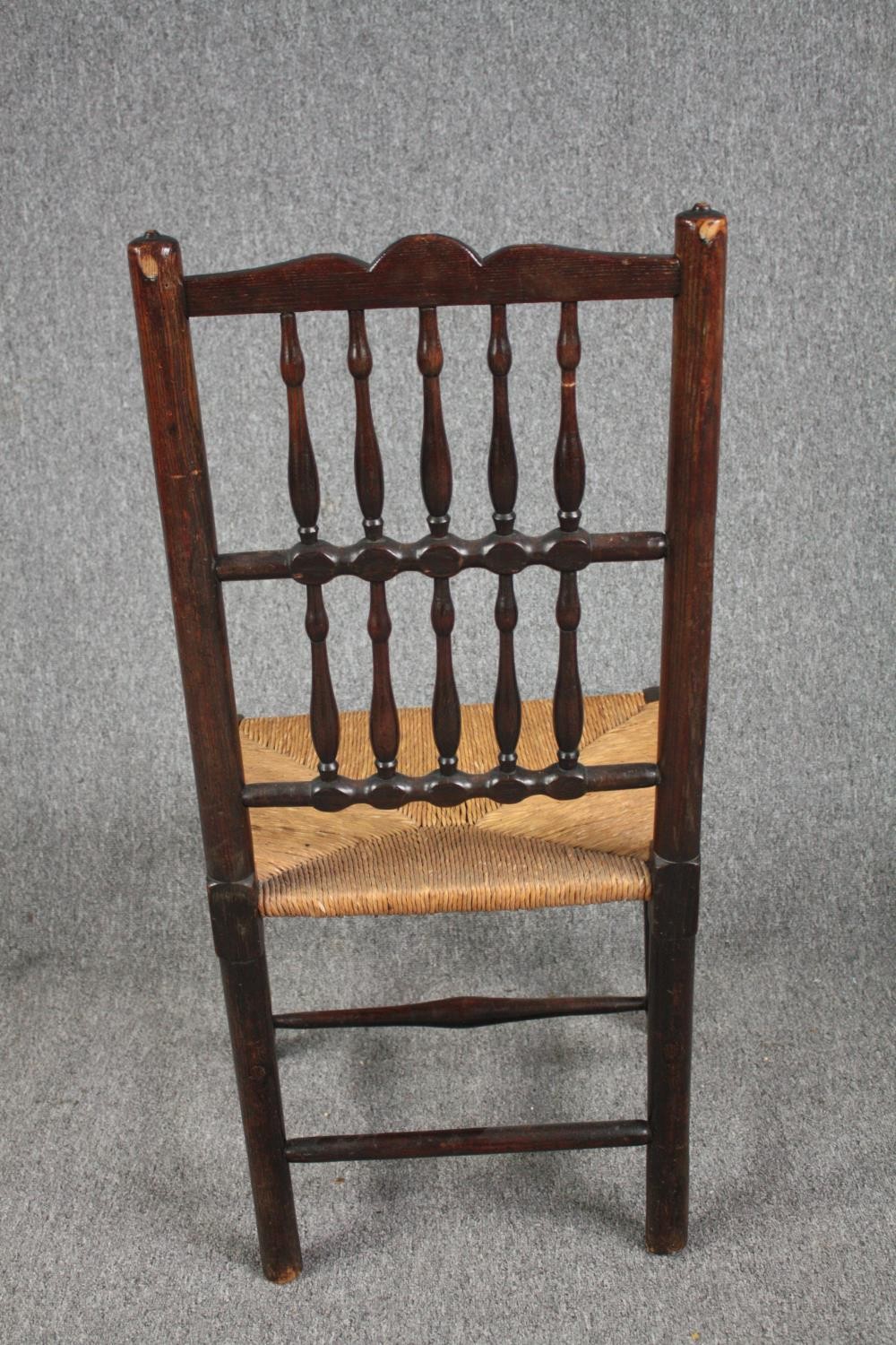 Dining chairs, a pair of early 19th century Lancashire style spindle back in elm and oak. - Image 5 of 6