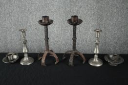 A collection of various candleholders. Three matching pairs. Pewter and metal. H.28cm. (largest)
