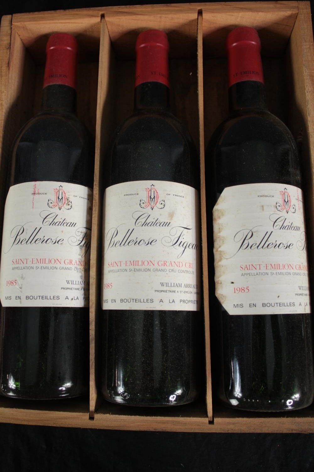 Cased St. Emillion French red wine bottled 1985. Three bottles.
