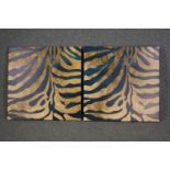 A pair of zebra prints on stretched canvas. H.82 W.8cm.(each)