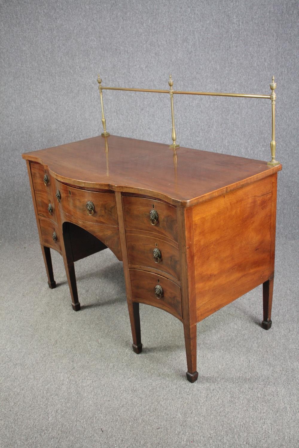 Sideboard, late Georgian mahogany serpentine fronted with brass rail. H.129 W.136 D.73cm. - Image 3 of 7