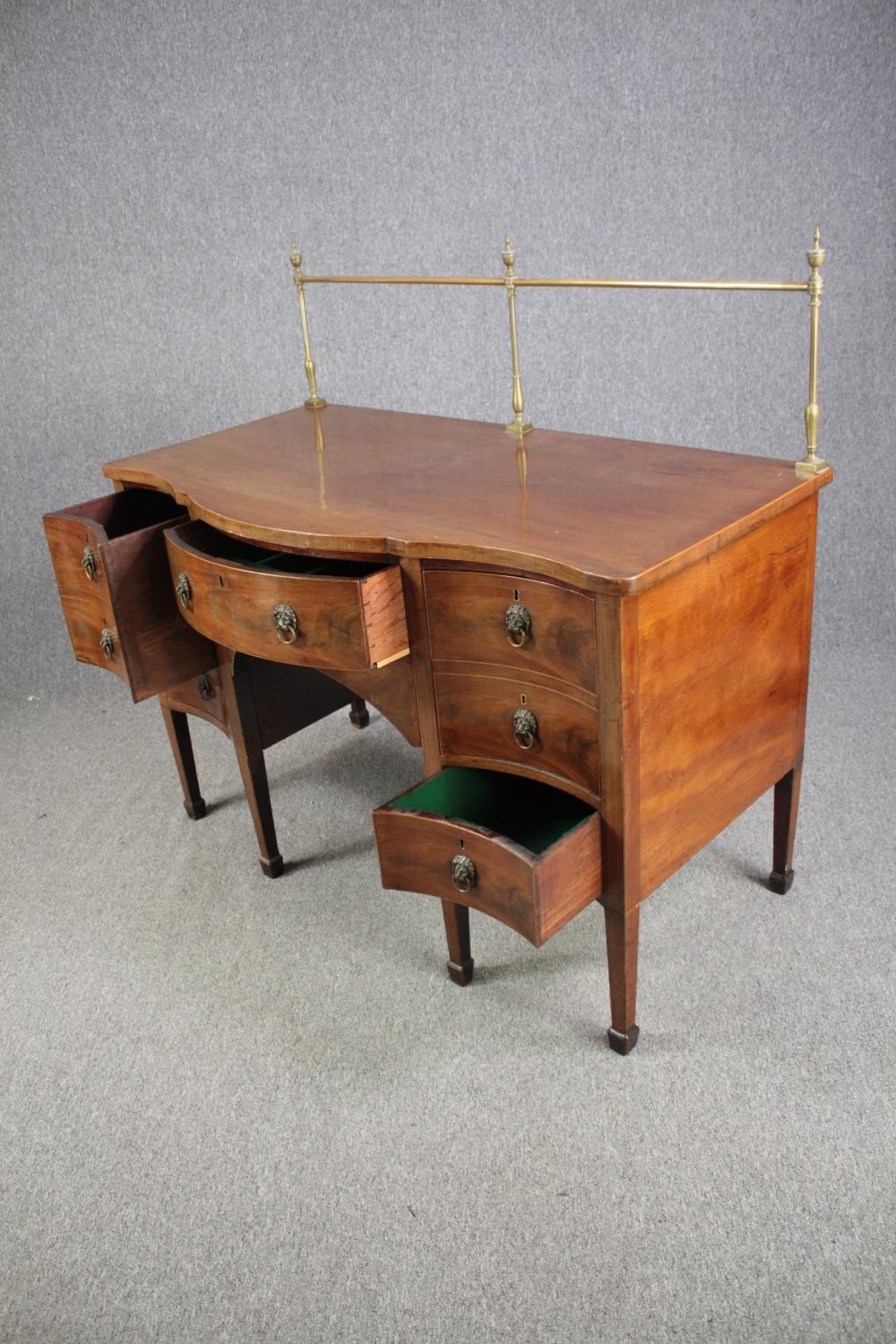 Sideboard, late Georgian mahogany serpentine fronted with brass rail. H.129 W.136 D.73cm. - Image 5 of 7