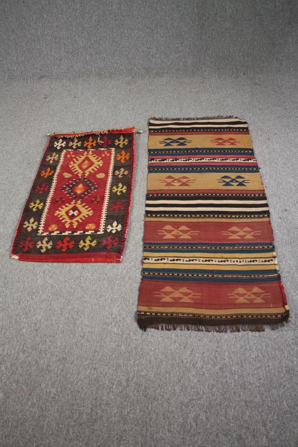 An Eastern rug along with a Kelim runner. L.137 W.60cm. (largest)