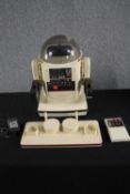 A 1980s Omnibot Robot made by Tomy. Boxed. Untested. Radio controlled and complete with tray. H.46