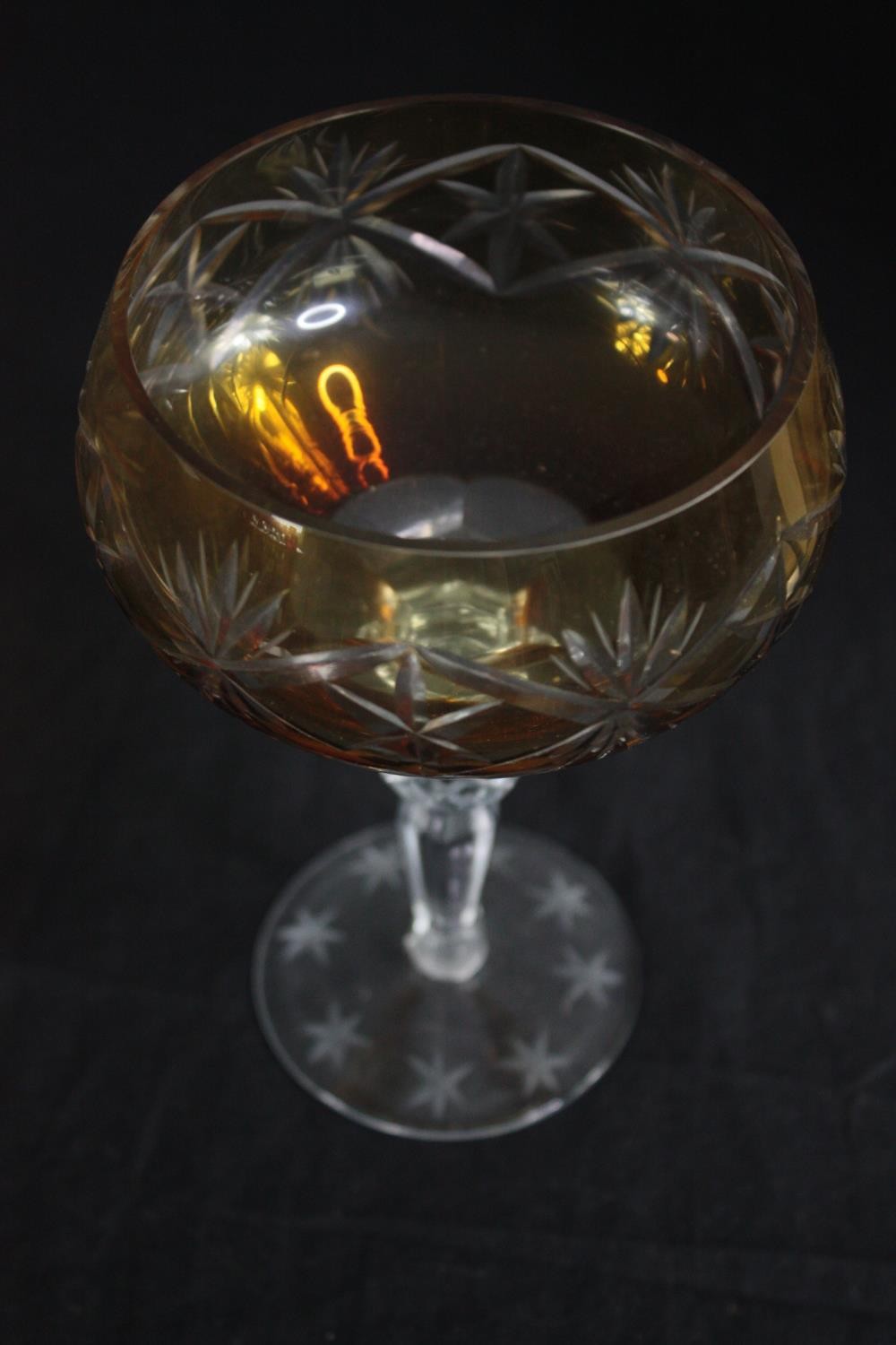 A set of six amber cut to clear stemmed wine glasses with star design. H.16cm. (each) - Image 3 of 3