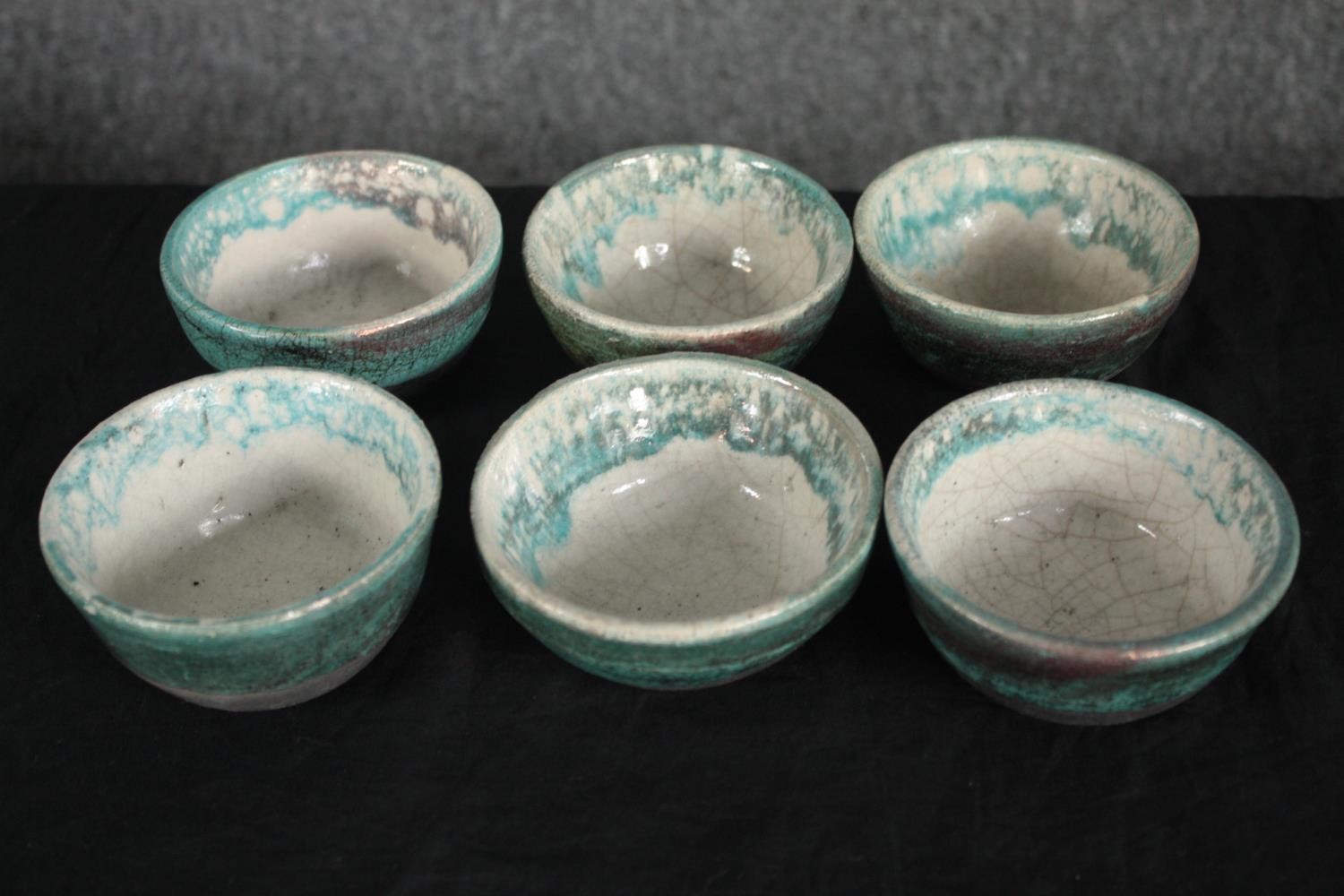 A collection of seven glazed bowls in a greenish teal. Dia.23cm. (largest) - Image 4 of 4