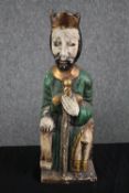 A carved and painted figure. Medieval king. Twentieth century. H.38cm.