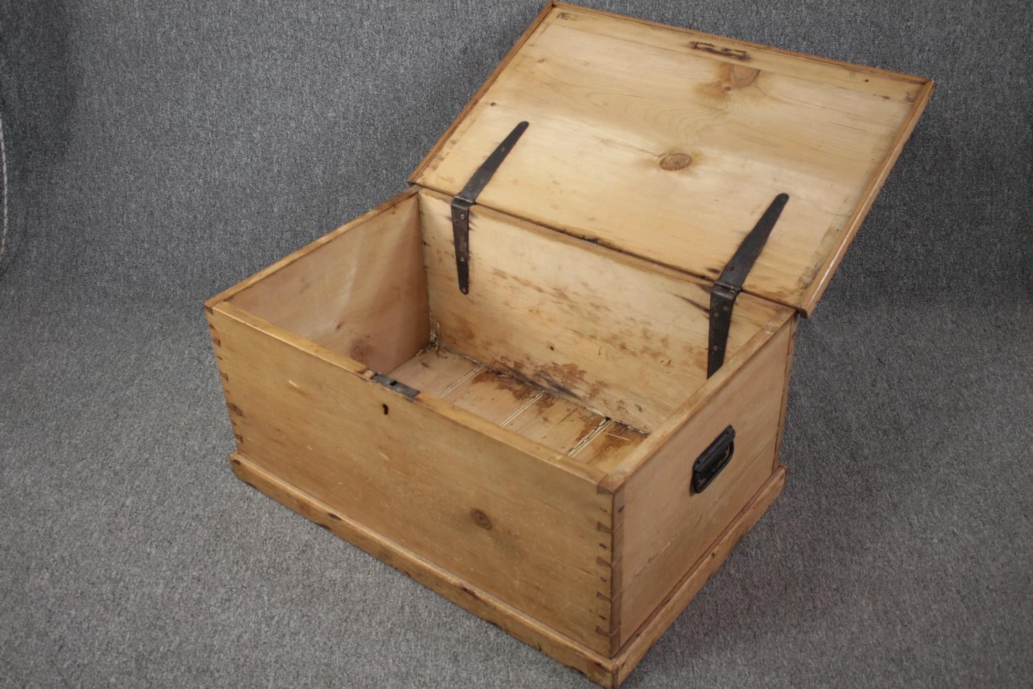 A 19th century pine travelling trunk. H.40 W.82 D.54cm. - Image 4 of 5