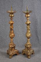 A pair of floor standing pricket candleholders, Baroque in style and gilt metal. H.110cm. (each)
