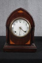 An Edwardian mahogany and satinwood mantel clock with a replacement modern movement. H.38 W.28 D.