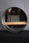 A contemporary industrial style metal framed mirror. Dia.80cm.