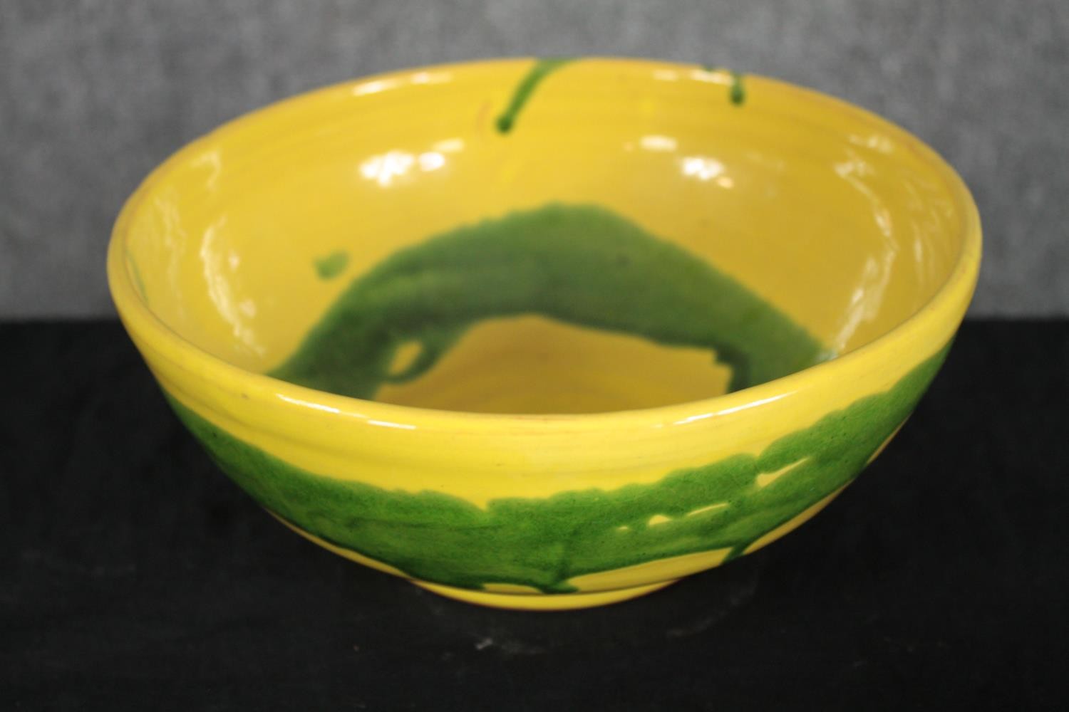 A collection of five bowls and three plates in various glazes, some signed on the base. H.32 W.23cm. - Image 3 of 9