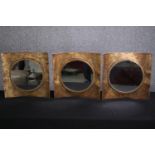 A set of three contemporary metal convex framed mirrors. H.40 W.40cm.(each)