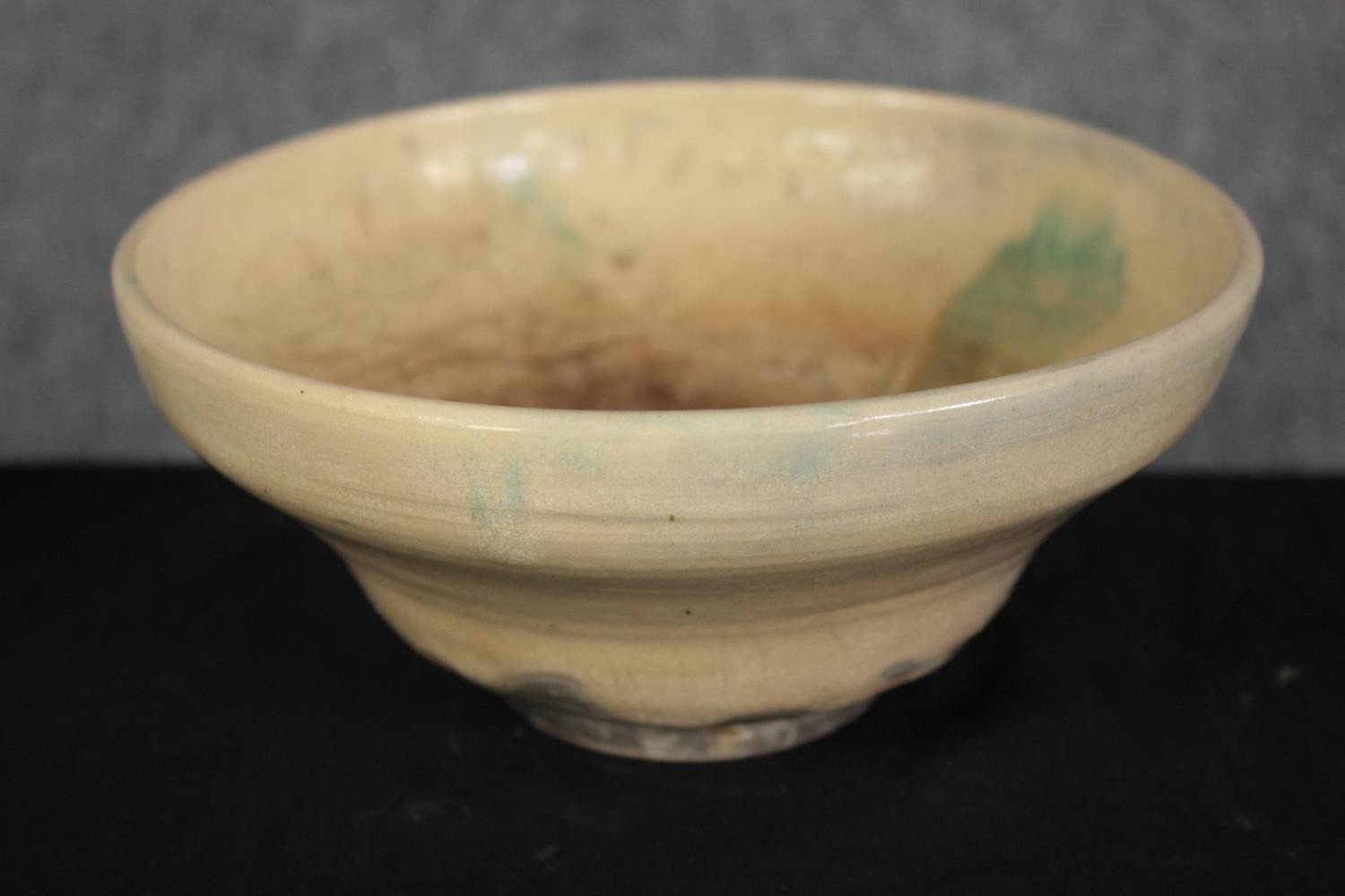 A collection of five bowls and three plates in various glazes, some signed on the base. H.32 W.23cm. - Image 4 of 9