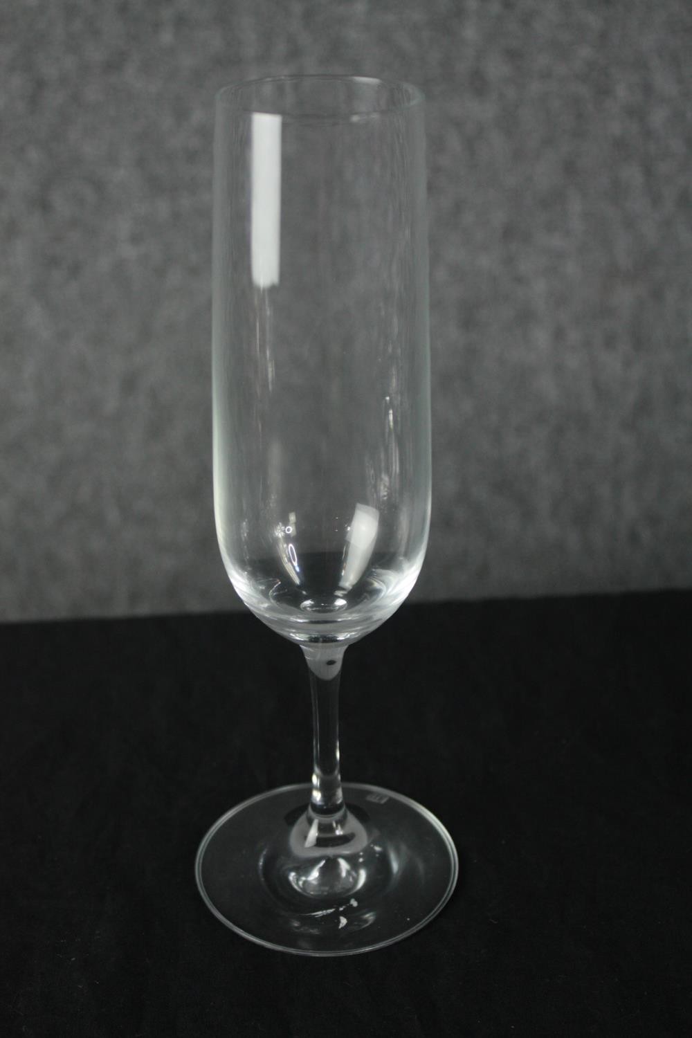 A collection of twenty-two Champagne glasses, one set by Dartington. H.23cm. (largest) - Image 3 of 4