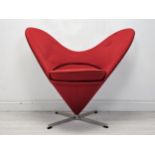 A Heart Cone chair after a 1950s design by Verner Panton for Vitra. H.91 W.108 D.60cm. (Some