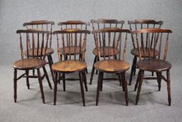 Kitchen dining chairs, a set of eight late 19th century stained beech.