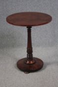 A mid 19th century mahogany lamp table. H.73 Dia.60cm.