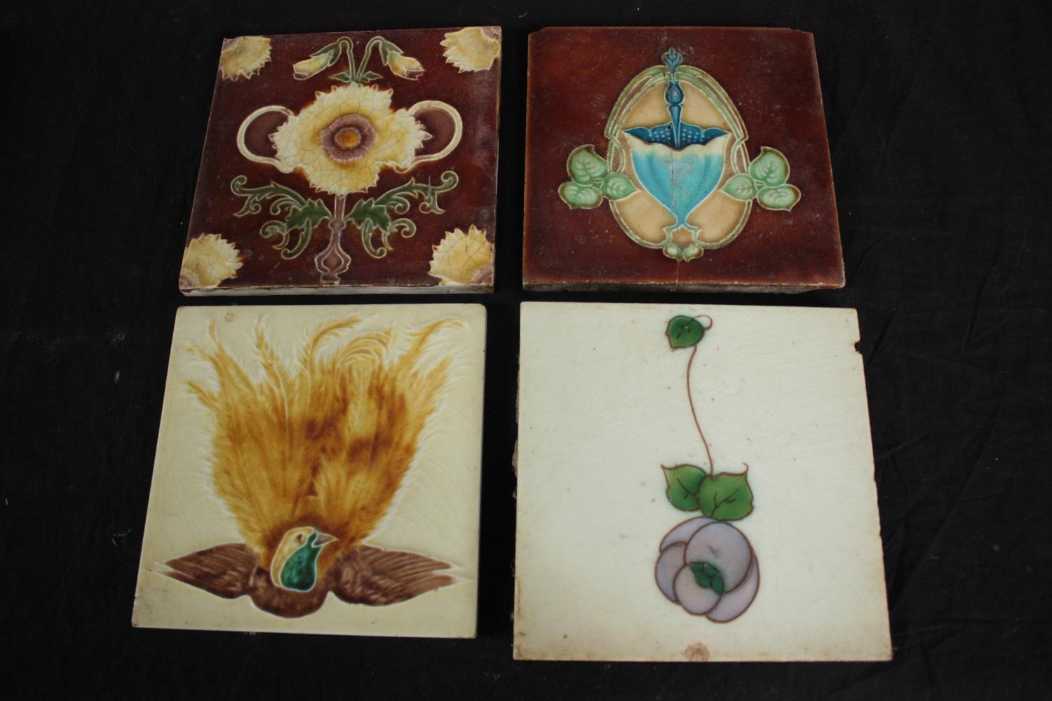 A mixed collection of twelve tiles. Including Art Nouveau and Majolica designs. H.15.5 W.15.5cm. - Image 2 of 5