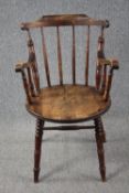 Armchair, 19th century beech with bar back on turned supports.
