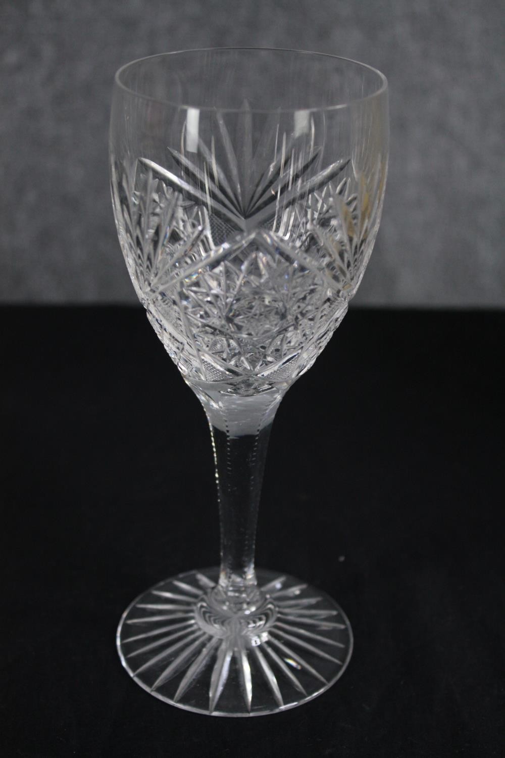 Eleven stemmed wine glasses. Cut crystal with star bases. H.20cm. (each) - Image 2 of 3