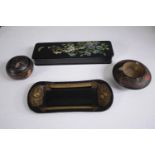 A lacquered box, ashtray, trinket box and a small tray. H.20 W.9cm. (largest)