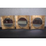 A set of three contemporary metal framed convex mirrors. H.40 W.40cm. (each)