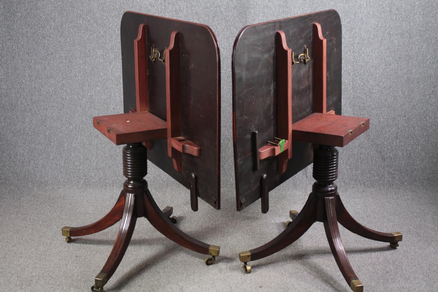 A George III mahogany twin pedestal dining table on quadruped swept supports terminating in brass - Image 5 of 5