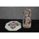 An Indian carved sandstone figure of an Indian deity along with a pietra dura coaster with floral