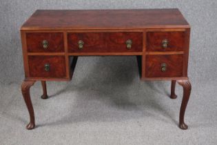 A mid century burr walnut Queen Anne style dressing table. H.78 W.113 D.53cm.