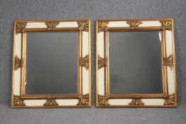 A pair of contemporary 19th century continental style wall mirror in gilt and painted frame. H.85