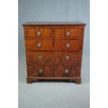 Chest of drawers, early Georgian figured walnut with a crossbanded top. H.102 W.97 D.48cm.