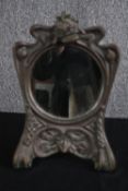 A metal gothic style vanity mirror. H.31 W.20cm.