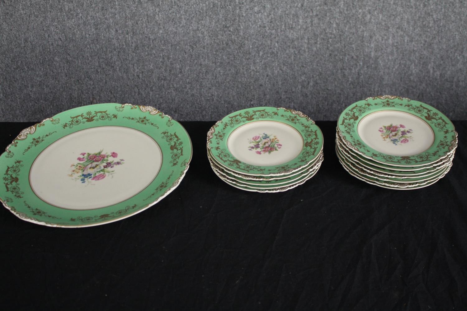 A German porcelain tea set for eleven people. 1930s Konig teacup & saucer, plates and creamer. In - Image 9 of 11
